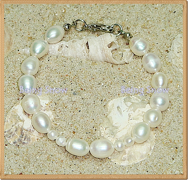 สร้อยข้อมือไข่มุกทรงรีเม็ดใหญ่ + ทรงกลมเม็ดเล็ก