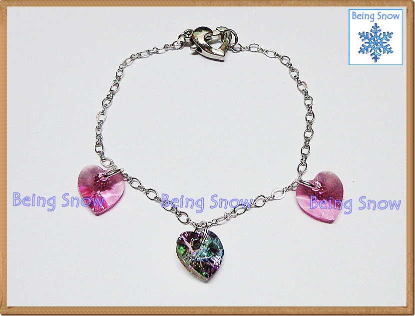 สร้อยข้อมือคริสตัลรูปหัวใจ สีม่วงเคลือบวาวพิเศษ + ชมพูใส