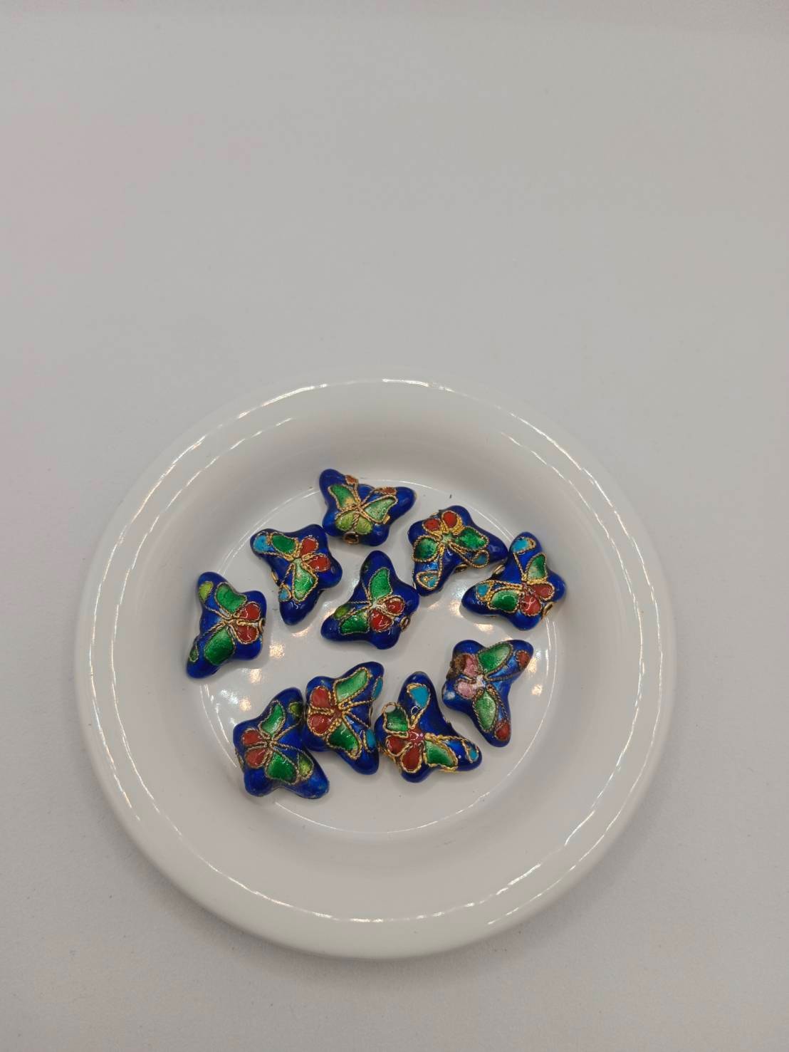 จี้กังใสรูปผีเสื้อ ถุงละ 80 บาท