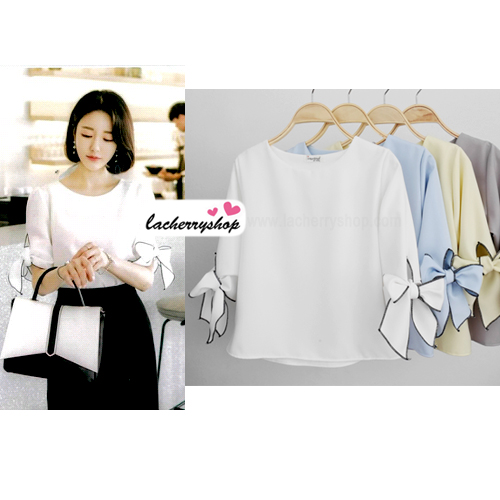 เสื้อแฟชั่นผ้าฮานาโกะ แบบสวยเรียบหรู สีขาว แขนสามส่วนผูกโบว์ สไตล์เกาหลีน่ารักๆ ผ้าฮานาโกะเนื้อดี ใส่สบาย ใส่ทำงาน ใส่เที่ยวได้ทุกโอกาส