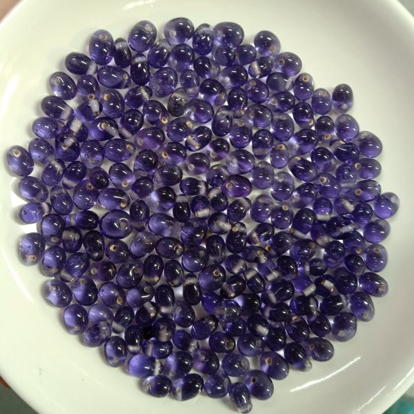ลูกปัดแก้ว ทรงหยดน้ำ สีม่วง 6x8มิล (1ขีด/100กรัม)