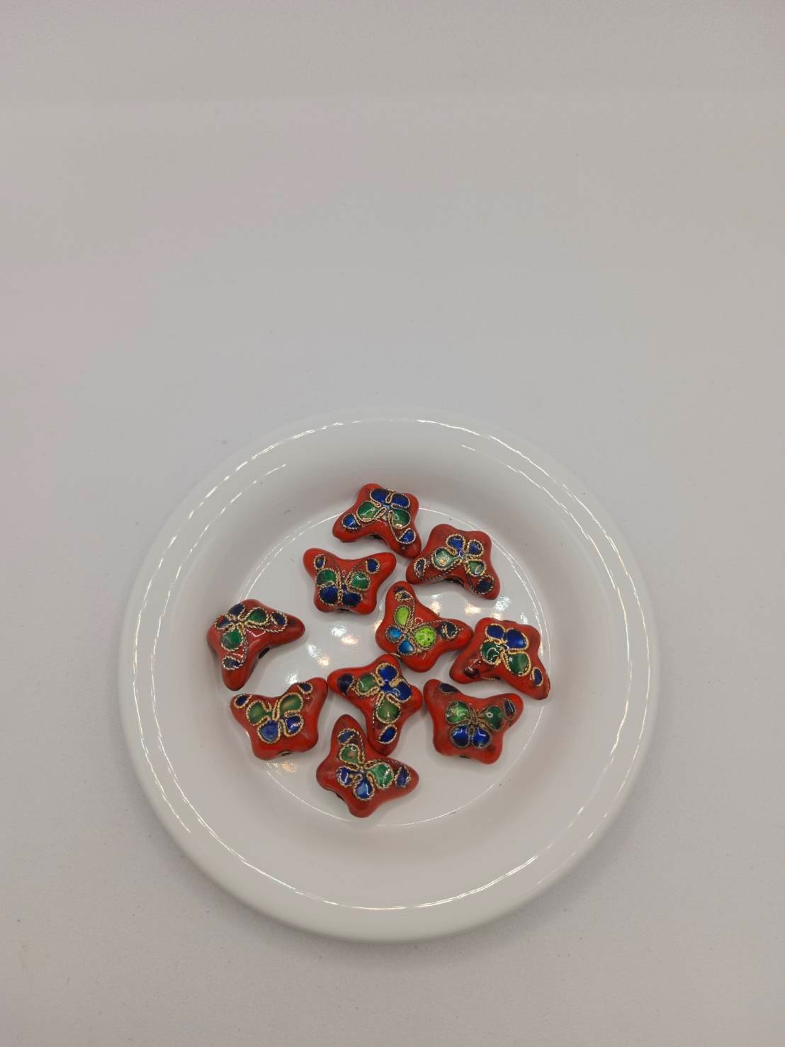 จี้กังใสรูปผีเสื้อ ถุงละ 80 บาท