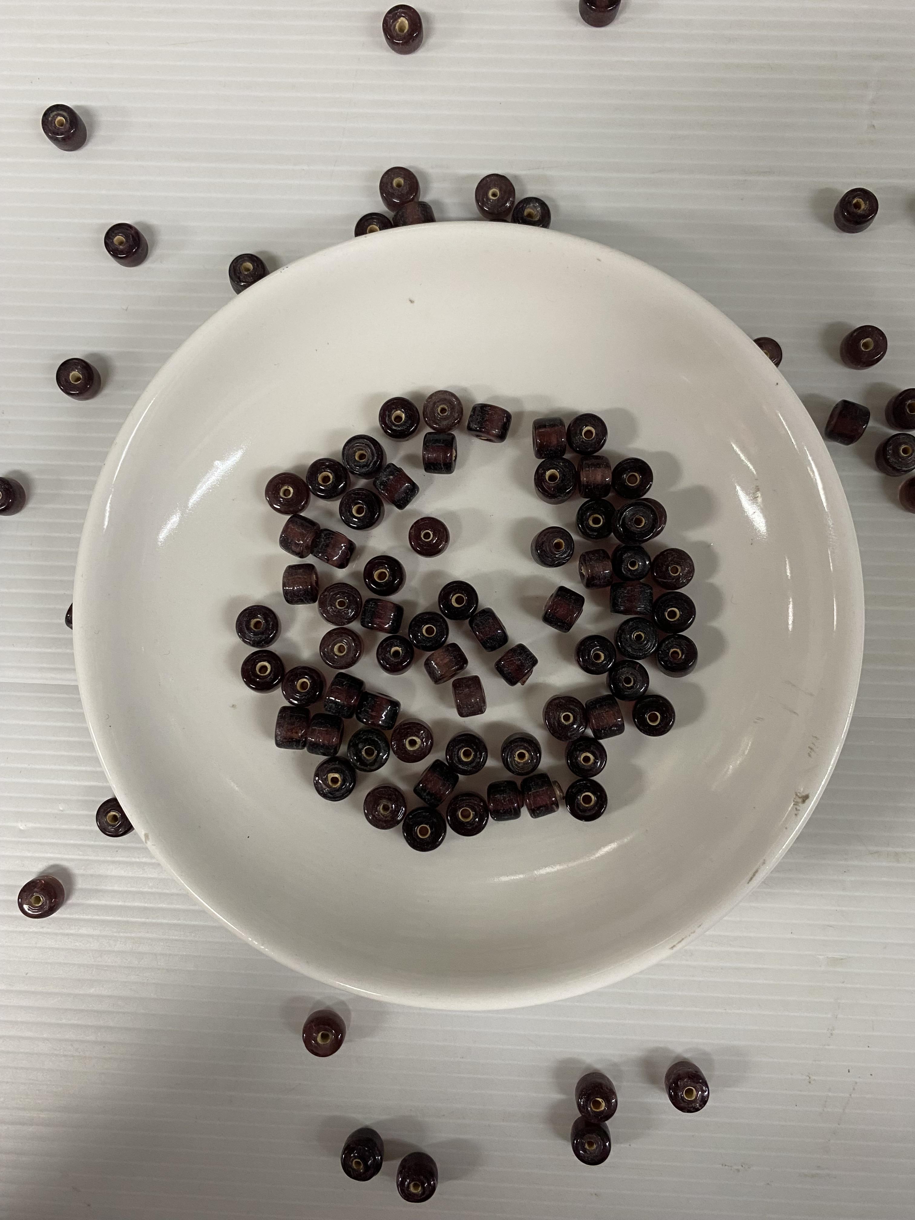 ลูกปัดแก้วอินเดียสองล้อสีม่วง9มิล100กรัม200บาท