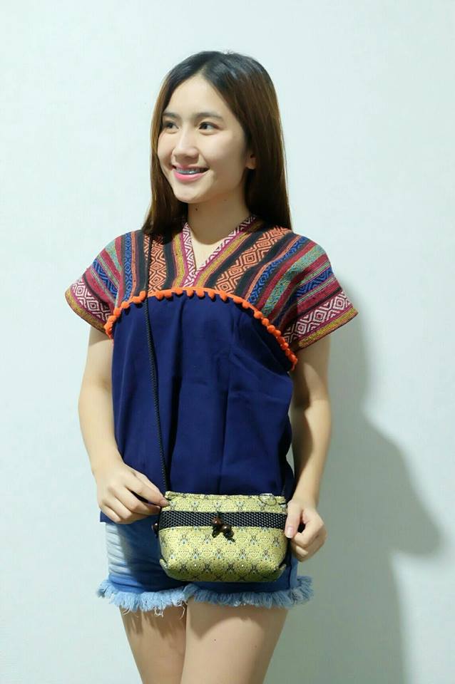 เสื้อนากา เสื้อผ้าพื้นเมือง เสื้อผ้าฝ้ายล้านนา คอวี โทนสีส้ม แต่งปอม ลายผ้าพื้นเมืองสวยๆ