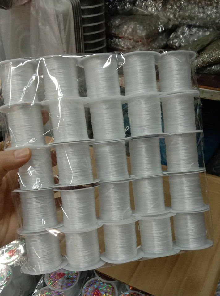 เอ็นยืดร้อยลูกปัด สีขาว ม้วนเล็ก 10 หลา แพคละ 375฿ (25 ม้วน)