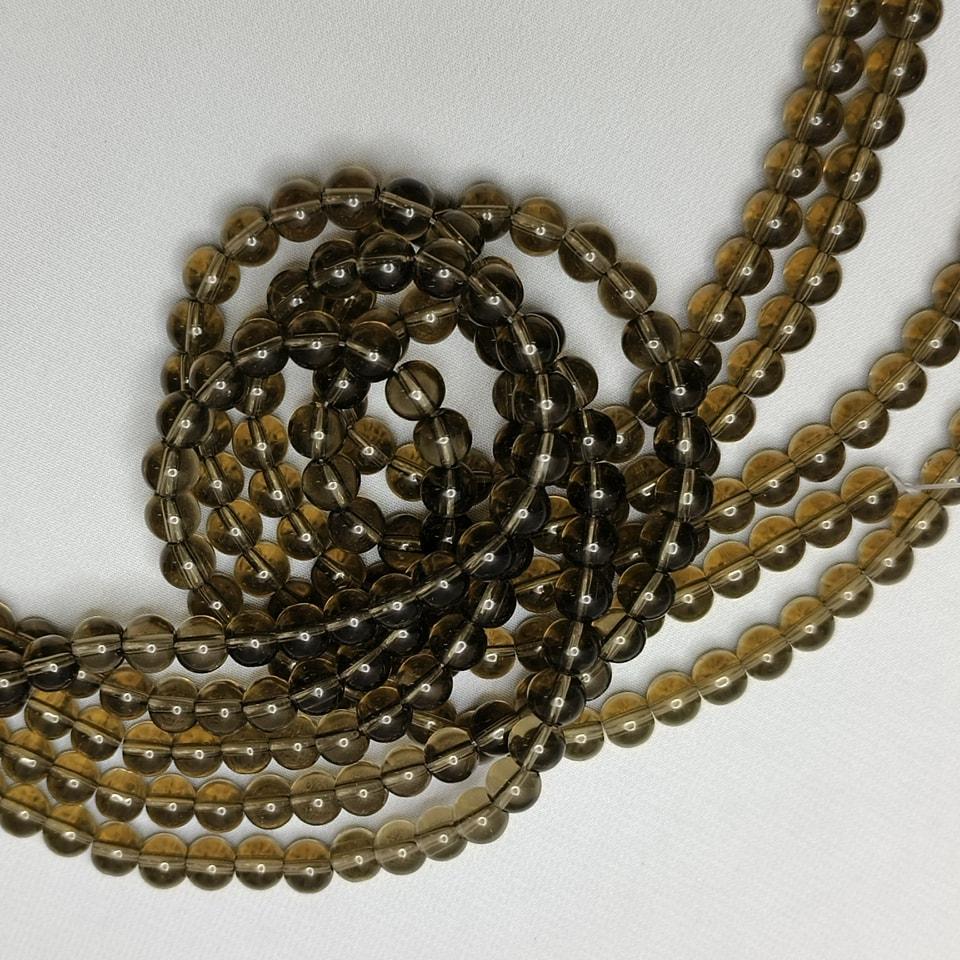 หินสโมกกี้ควอทซ์ หินจอมเวทย์ บรรลุเป้าหมาย ความสำเร็จ ลดเครียด ยาว 37 ซม. 10 มิล (42 เม็ด)