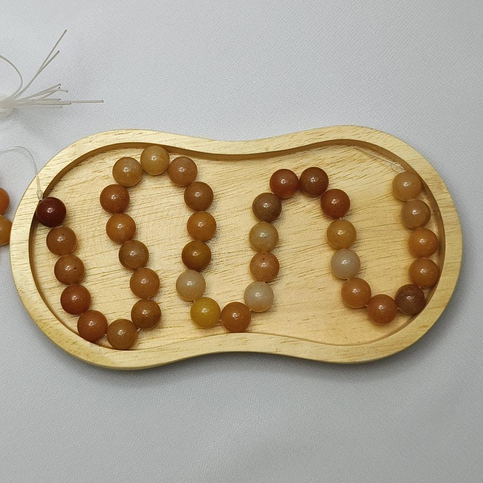 หินหยกน้ำผึ้ง หินเสริมโชคการเงิน เจริญรุ่งเรือง สุขภาพดี มีเงินทอง ยาว 37 ซม. 12 มิล (34 เม็ด)