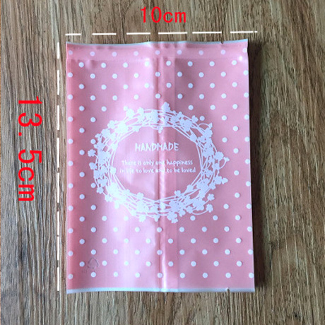 ถุงซีลบรรจุขนมใสลายจุดสีชมพู ขนาด 10x13.5 cm. Hand Made 100 ใบ