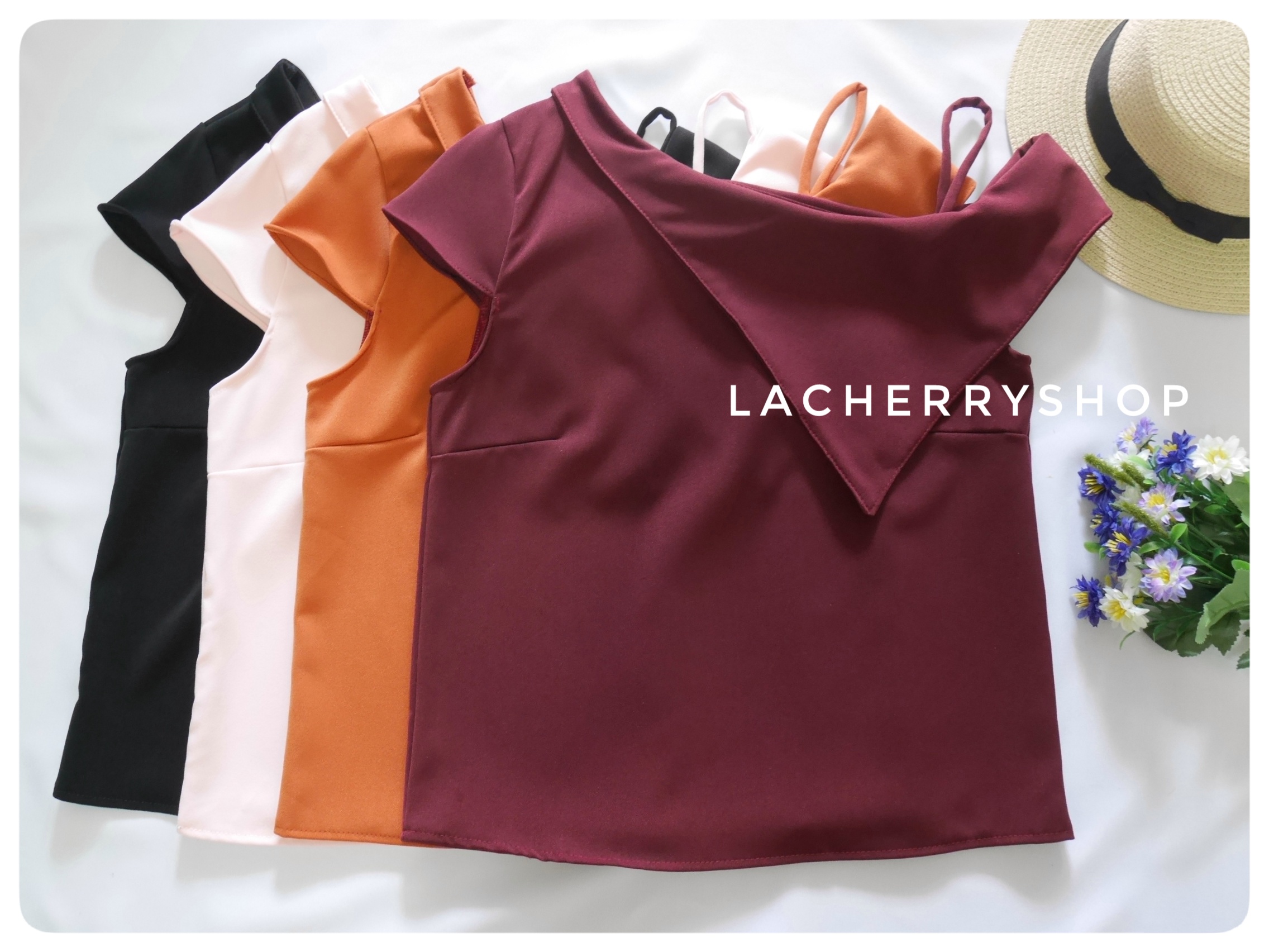 เสื้อแฟชั่นผ้าฮานาโกะ (สีดำ) ปาดไหล่ข้างเดียว ตัดแต่งผ้าช่วงอกเก๋ๆ เพิ่มสายเดี่ยวเพื่อความมั่นใจให้ลุคสวยเปรี้ยว