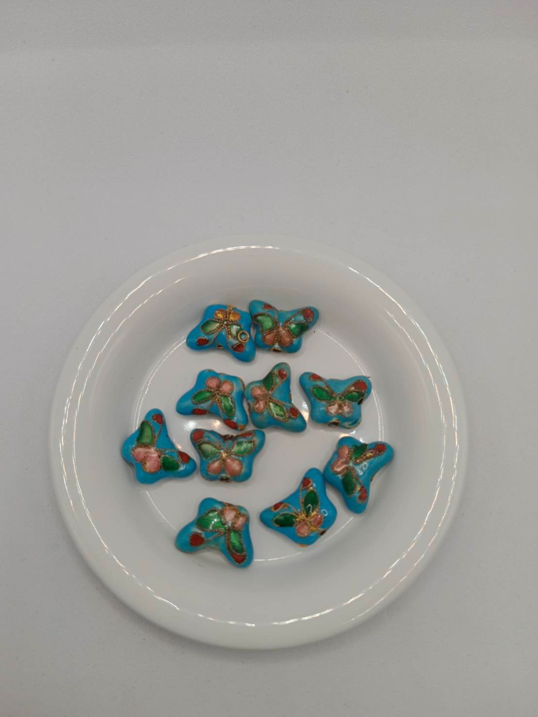 จี้กังใสรูปผีเสื้อ ถุงละ 80 บาท