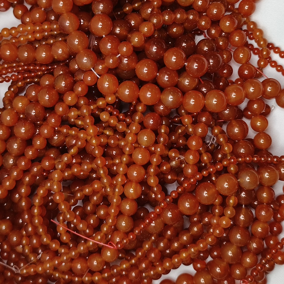 หินคาร์เนเลียน - หินลดความเศร้า ลดความกดดัน อารมณ์ดี พูดเก่ง ยาว 37 ซม. 12 มิล (34 เม็ด)