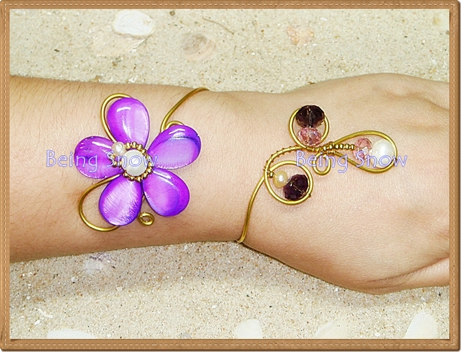 กำไลดอกไม้ - สีม่วง **แถมต่างหูทองเหลือง 1 คู่**