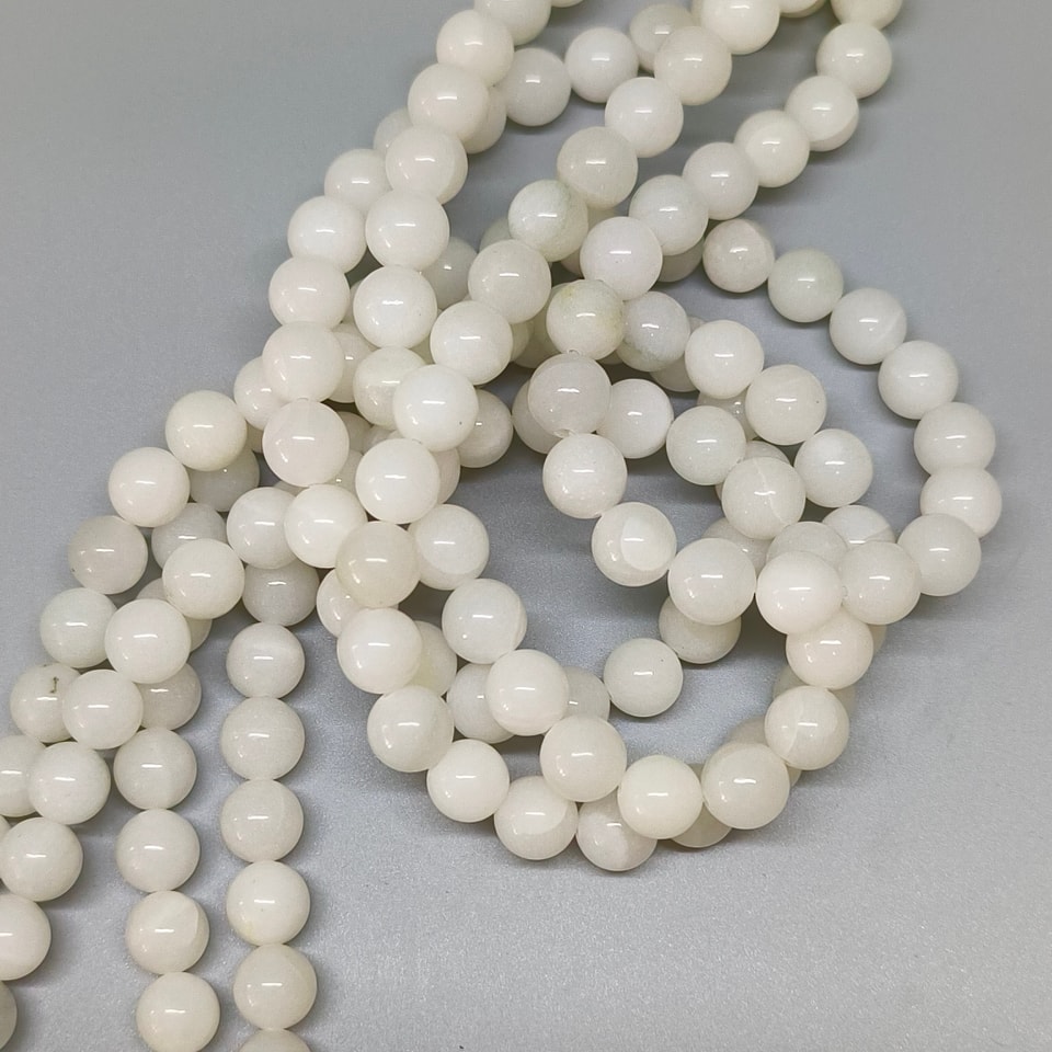 หินมูนสโตน (Moonstone) "หินของนักเดินทาง" 10 มิล (42เม็ด/เส้น) 250฿