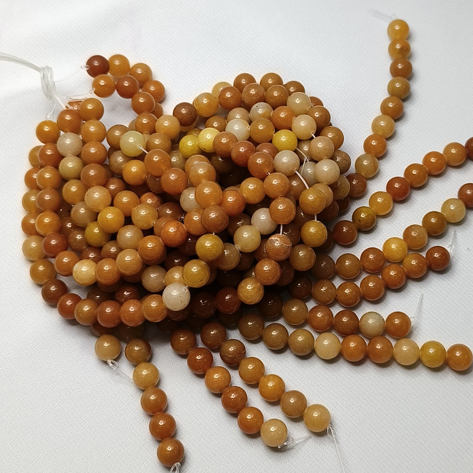 หินหยกน้ำผึ้ง หินเสริมโชคการเงิน เจริญรุ่งเรือง สุขภาพดี มีเงินทอง ยาว 37 ซม. 10 มิล (42 เม็ด)