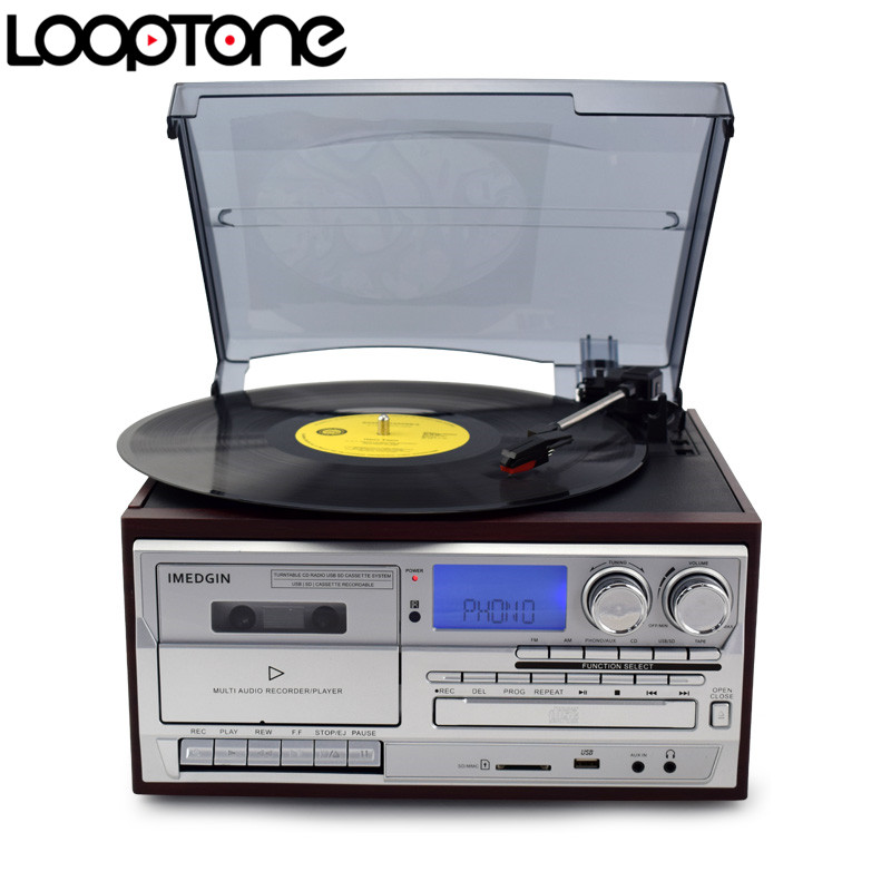 เครื่องเล่น Looptone สามารถเล่นแผ่นเสียงทุกขนาด , CD , USB , MD card , cassett Tape , วิทยุ AM /FM มี ฺBT
