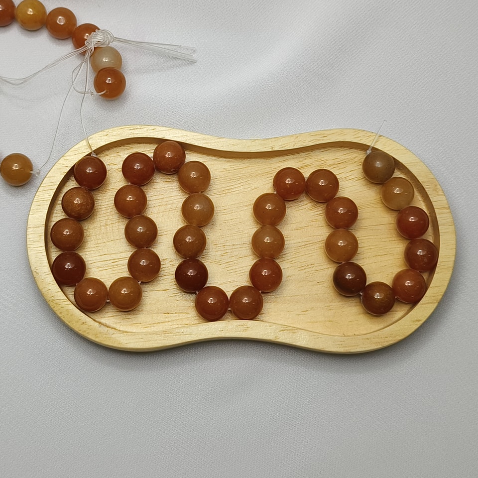 หินหยกน้ำผึ้ง หินเสริมโชคการเงิน เจริญรุ่งเรือง สุขภาพดี มีเงินทอง ยาว 37 ซม. 10 มิล (42 เม็ด)