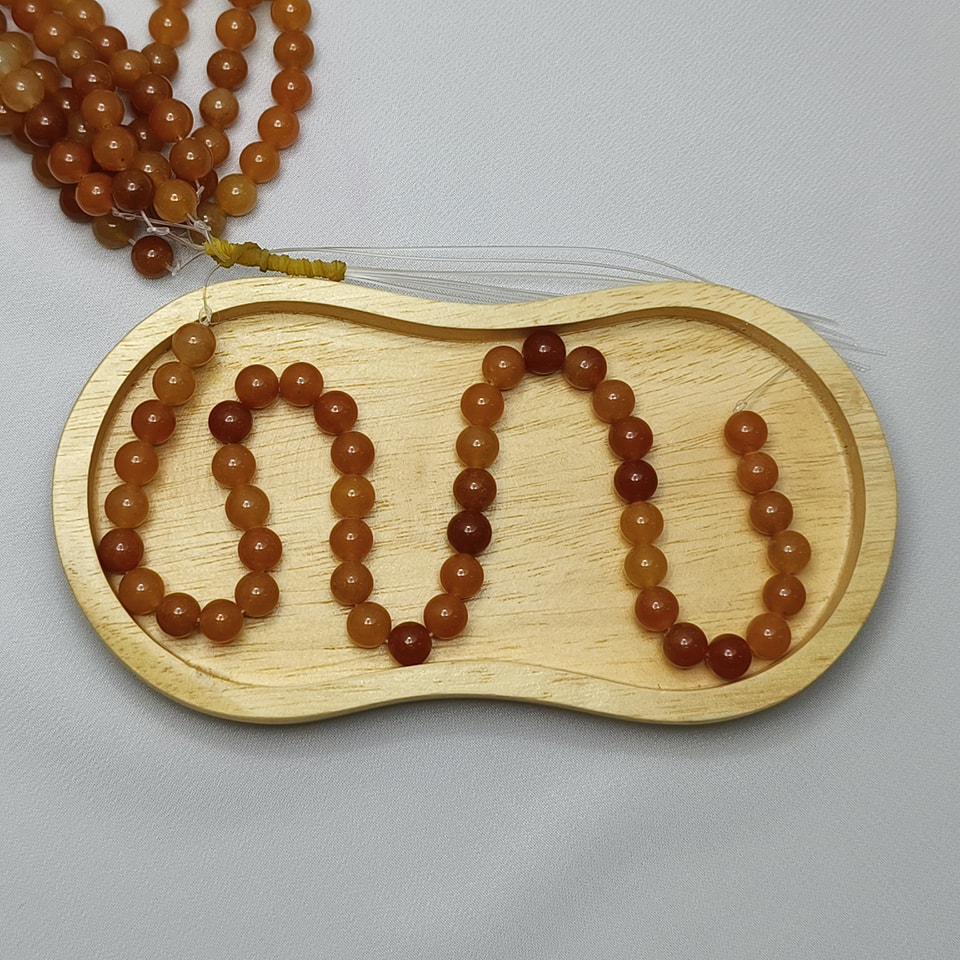 หินหยกน้ำผึ้ง หินเสริมโชคการเงิน เจริญรุ่งเรือง สุขภาพดี มีเงินทอง ยาว 37 ซม. 10 มิล (42 เม็ด)