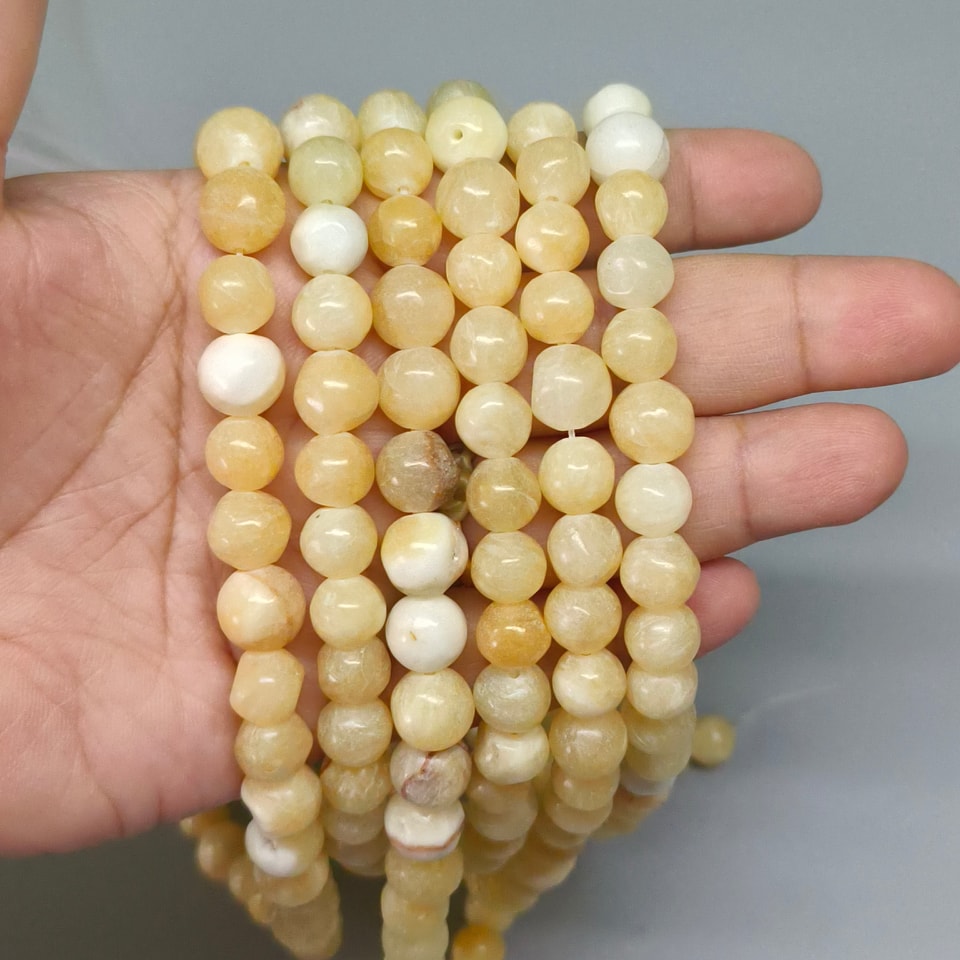 หินซิทริน(Citrine) หินของพ่อค้า 10 มิล (42เม็ด/เส้น) 250฿