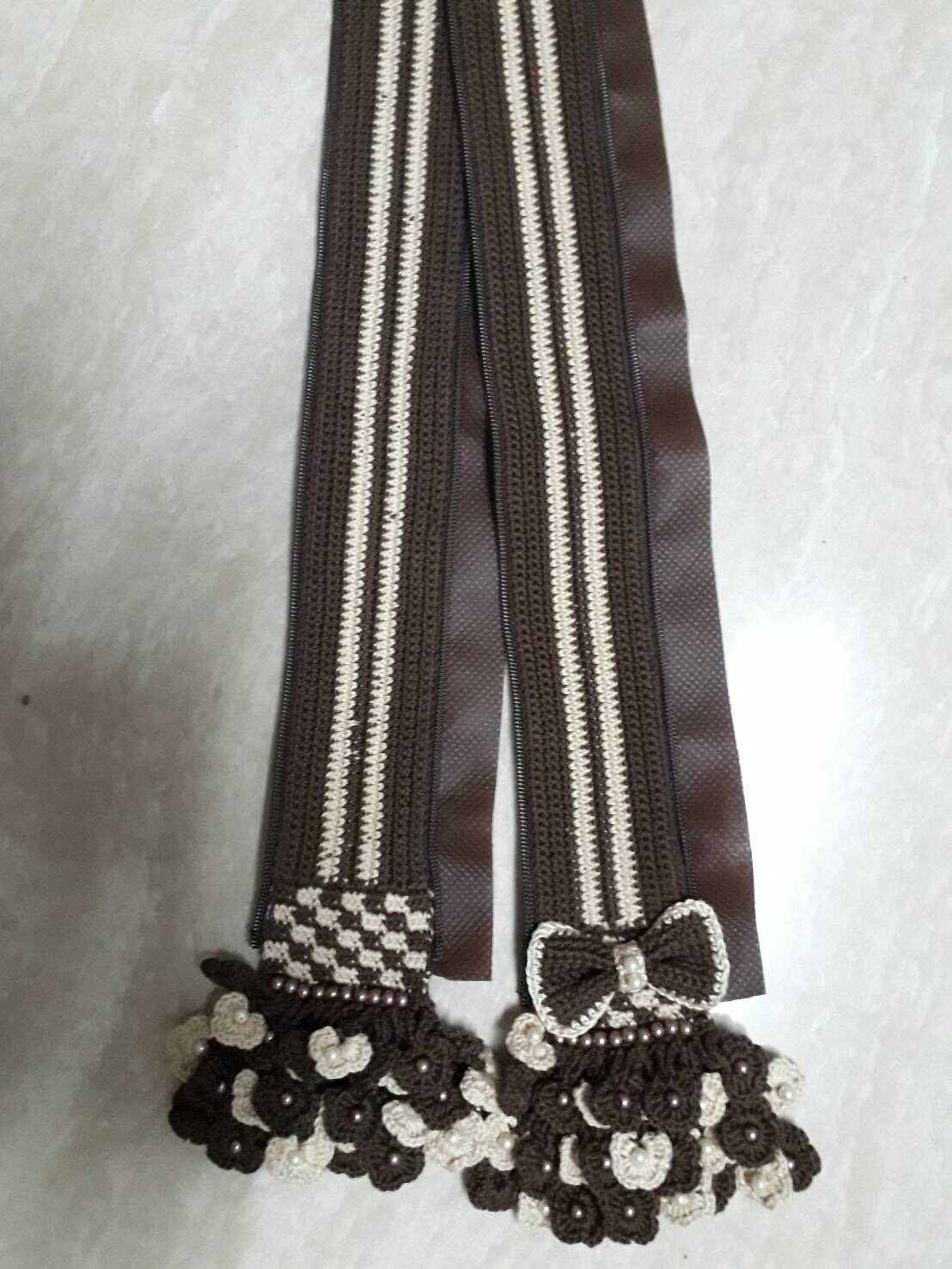 หูถัก LV Tivoli PM, Tivoli GM