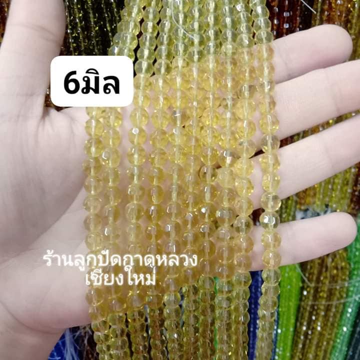 คริสตัลจีน ทรงกลมเจียร สีเหลือง 6มิล (1เส้น)