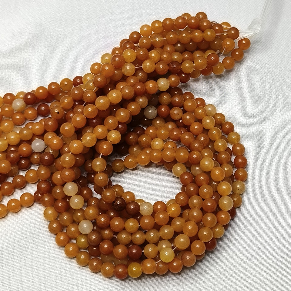 หินหยกน้ำผึ้ง หินเสริมโชคการเงิน เจริญรุ่งเรือง สุขภาพดี มีเงินทอง ยาว 37 ซม. 6 มิล (63 เม็ด)