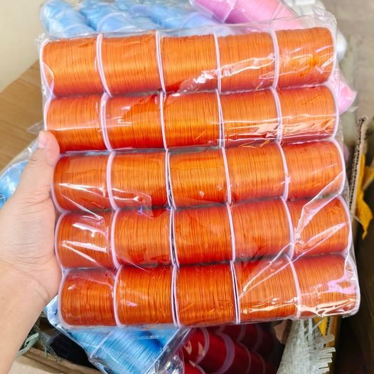 เอ็นยืดร้อยลูกปัด สีส้ม ม้วนใหญ่ 50 หลา แพคละ 750฿ (25 ม้วน)