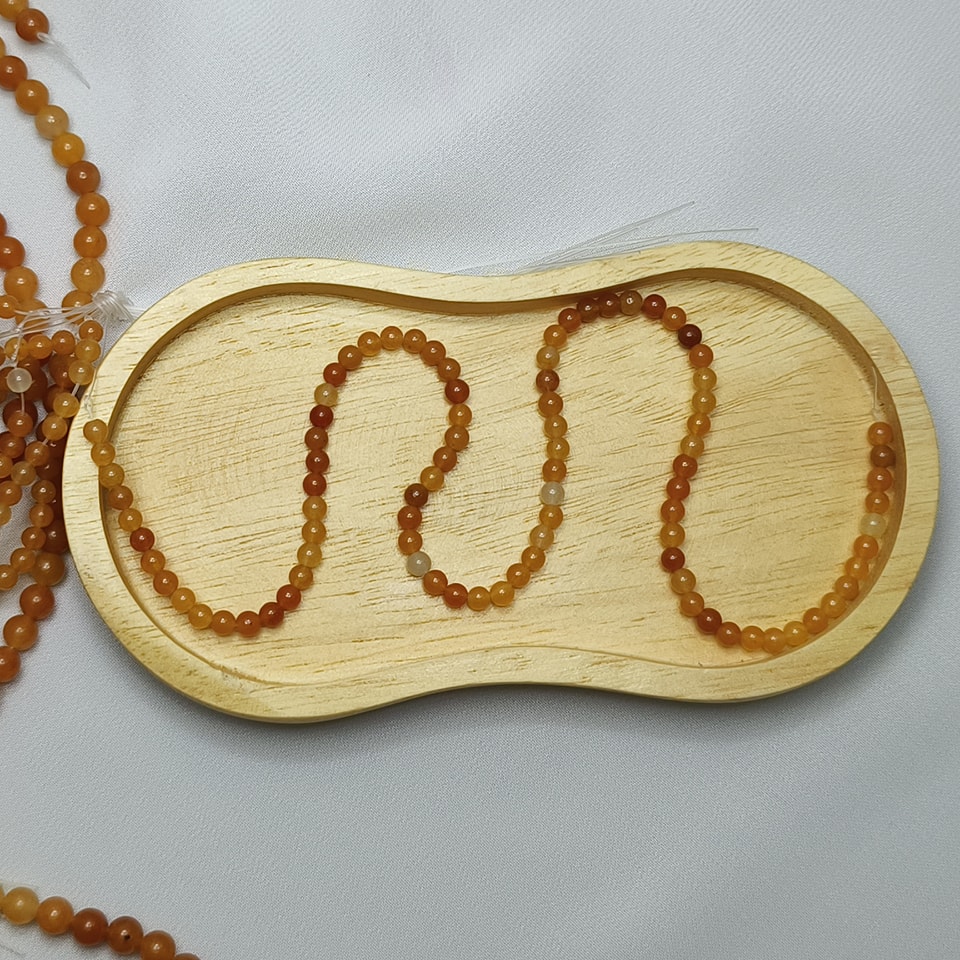 หินหยกน้ำผึ้ง หินเสริมโชคการเงิน เจริญรุ่งเรือง สุขภาพดี มีเงินทอง ยาว 37 ซม. 4 มิล (98 เม็ด)