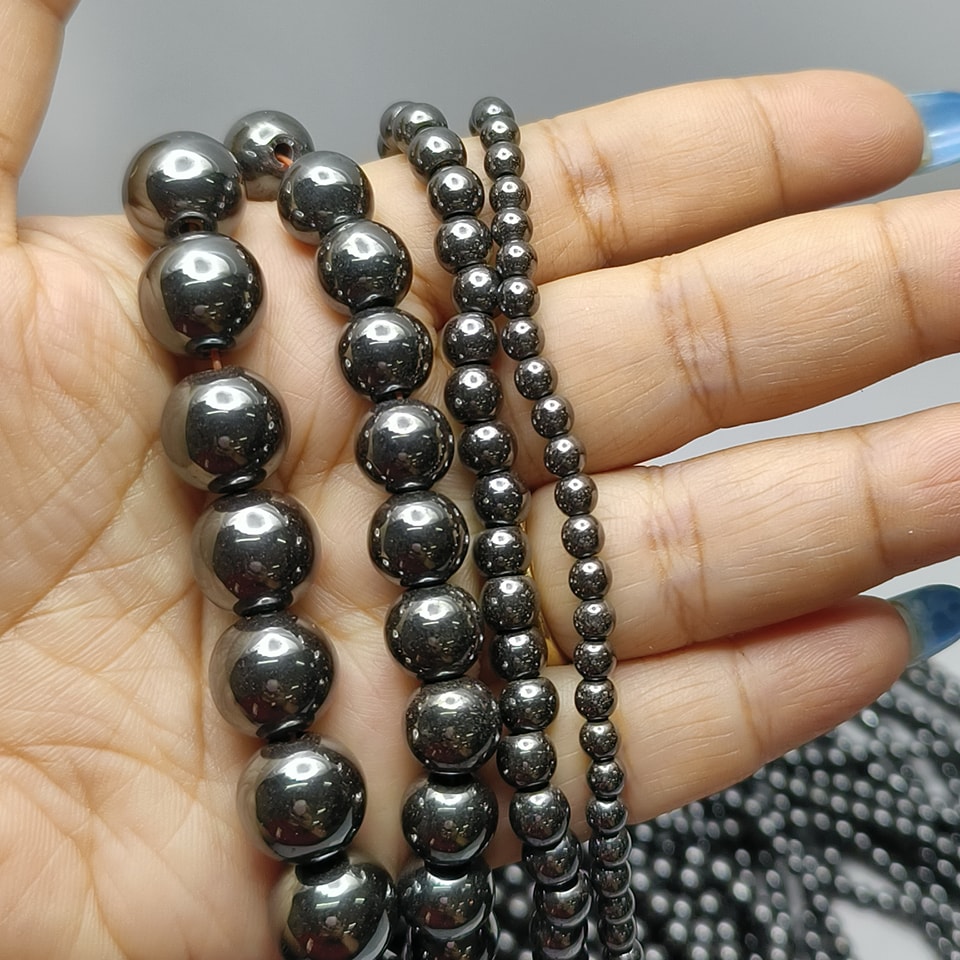 แร่หินเฮมาไทล์ หินพลังกำลัง - แข็งแกร่ง กล้าหาญ พละกำลัง ยาว 37 ซม. 6 มิล (63 เม็ด)