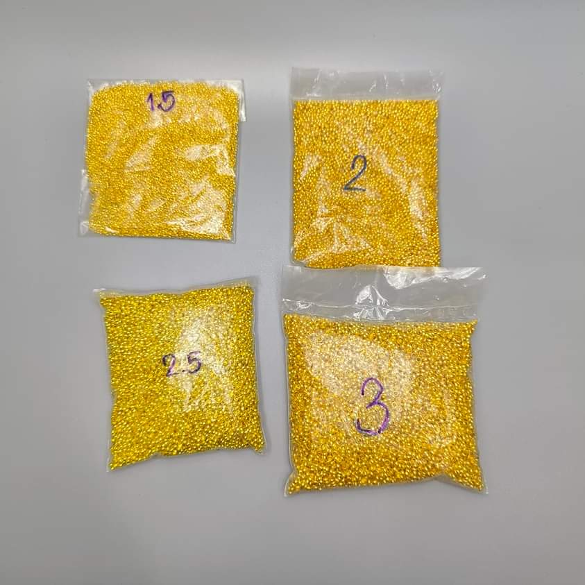 สต๊อปเปอร์ เม็ดบีบกลม สีทอง 2 มิล 100กรัม/400 บาท