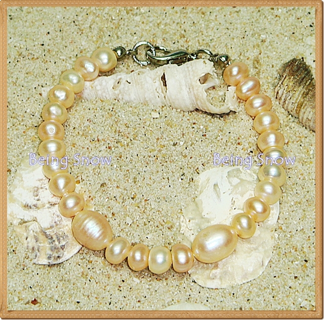 สร้อยข้อมือไข่มุกทรงข้าวโพด + ทรงรีเม็ดกลาง