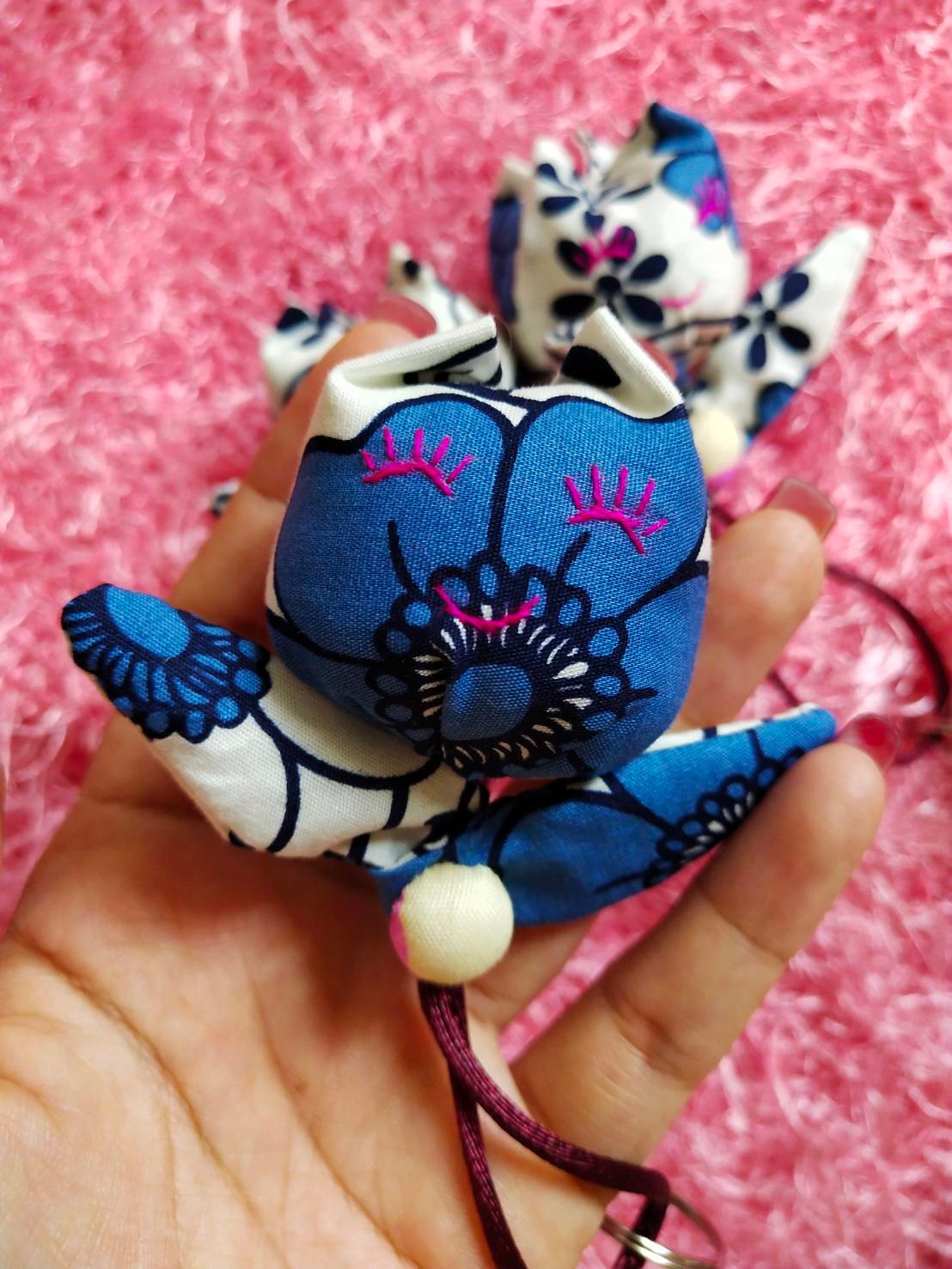 พวงกุญแจน้องยิ้มหวาน