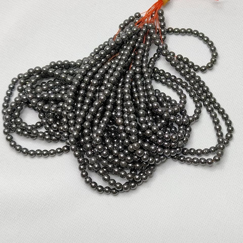 แร่หินเฮมาไทล์ หินพลังกำลัง - แข็งแกร่ง กล้าหาญ พละกำลัง ยาว 37 ซม. 6 มิล (63 เม็ด)