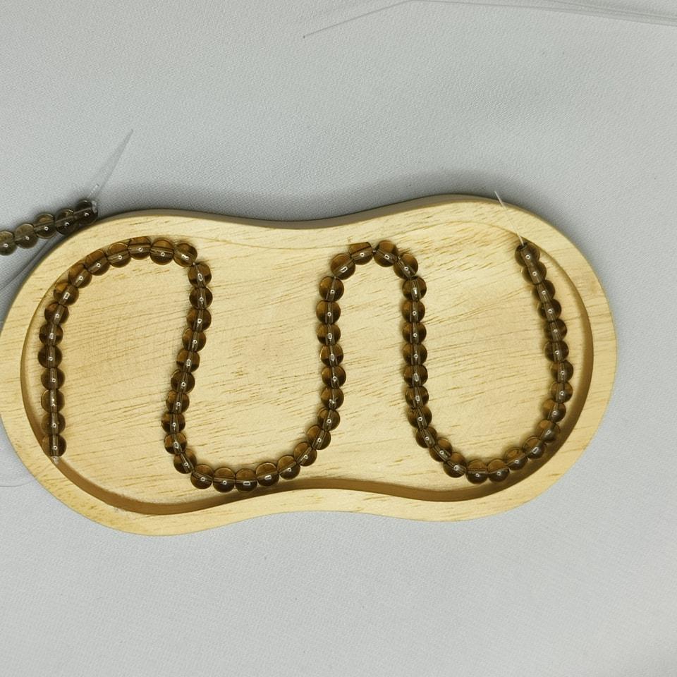 หินสโมกกี้ควอทซ์ หินจอมเวทย์ บรรลุเป้าหมาย ความสำเร็จ ลดเครียด ยาว 37 ซม. 6 มิล (63 เม็ด)