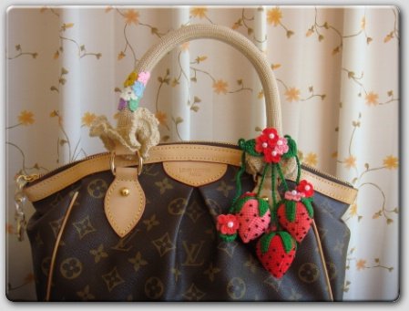 หูถัก LV Tivoli PM, Tivoli GM