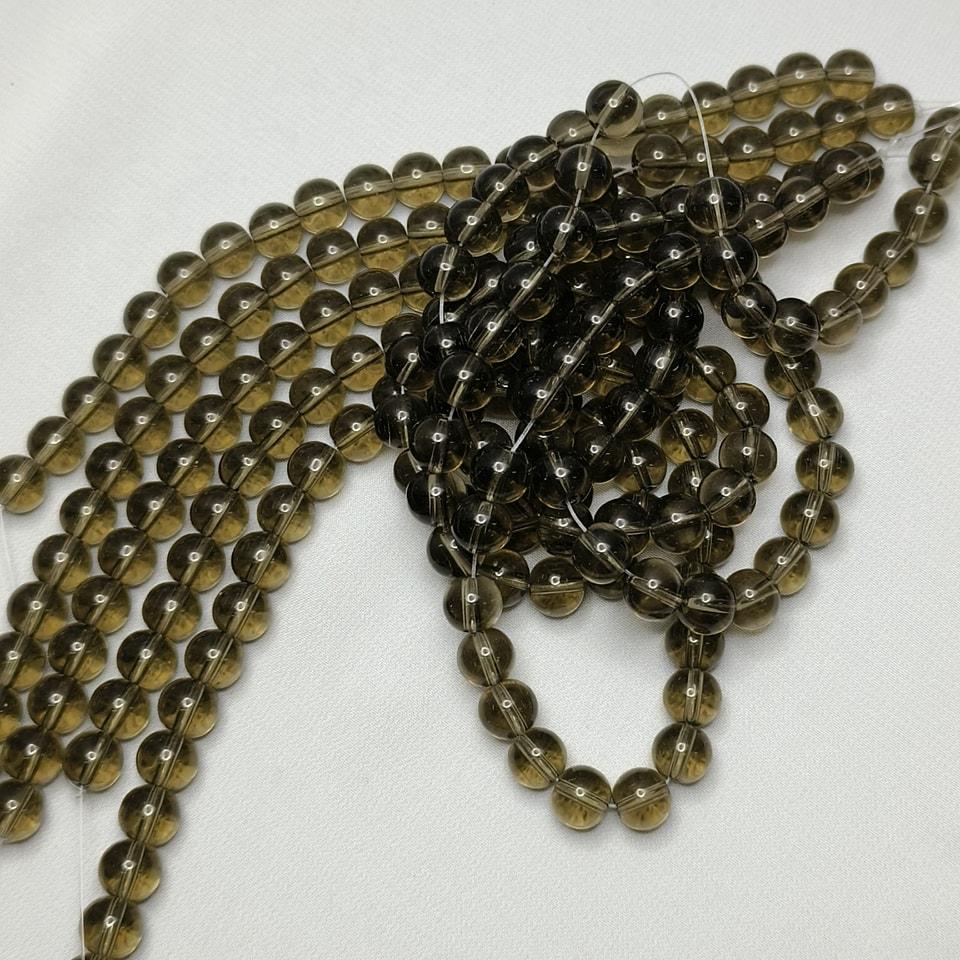 หินสโมกกี้ควอทซ์ หินจอมเวทย์ บรรลุเป้าหมาย ความสำเร็จ ลดเครียด ยาว 37 ซม. 8 มิล (50 เม็ด)