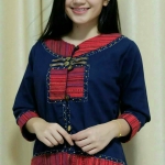 งานเสื้อคลุม งานเสื้อคลุมผ้าฝ้าย รุ่นเหรียญ แต่งแถบด้วยผ้าทอ แบบสวยงามตามแบบฉบับชาวล้านนา